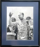 FRANK GARDNER: A framed photograph of Frank Gardner winning the Tasman Trophy, 58cm x 68cm [Location: Sydney]