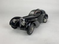 BUGATTI: 1:18 scale Bugatti Type 57 SC Atlantic coupe Chassis NR 57.591 in black produced by CMC (NB description)