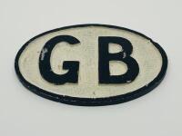 CAR BADGE "GB": Aluminium&nbsp;cast plate with "GB"&nbsp;letters in black and white [Location: Sydney]