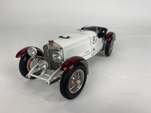 MERCEDES BENZ: 1:18 Mercedes Benz SSKL 1931 numbered 87 in white and maroon produced by CMC (NB description)
