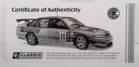 HOLDEN VS COMMODORE:&nbsp;A 1:18 scale Holden VS Commodore, the number #11&nbsp;race car, as raced to victory at Bathurst 1997, driven by Larry Perkins & Russell Ingall, finished in a 25th anniversary silver&nbsp;livery - 4