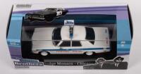DODGE MONACO: A 1:43 scale Dodge Monaco police car, a replica of the Chicago police car from the Blues Brothers movie