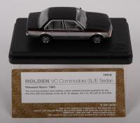 HOLDEN VC COMMODORE:&nbsp;A 1:43 scale&nbsp;Holden VC Commodore SL/E sedan&nbsp;model, finished in black over silver paintwork