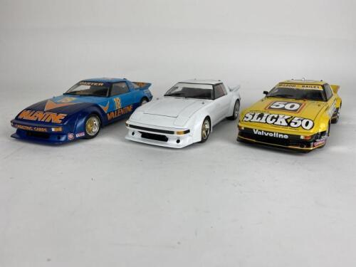 MAZDA: Three 1:18 Mazda RX-7 models by Biante. Murray Carter signature (NB description)