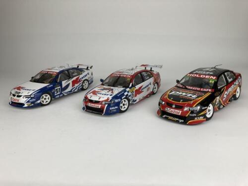 HOLDEN: Three 1:18 scale Holden Commodore V8 racing cars (NB description)