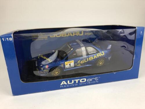 SUBARU: 1:18 scale Subaru Impreza WRC Saxon Safari 1999 produced by AutoArt (NB description)