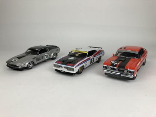 FORD: Three 1:18 scale Moffat Ford racing cars (NB description)