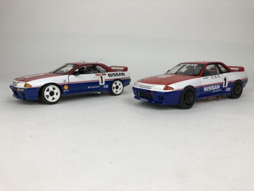 NISSAN: Two 1:18 scale Nissan skyline 1991 winners model racing cars (NB description)