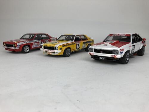 HOLDEN: Three 1:18 scale Holden Torana racing cars produced by AutoArt (NB description)