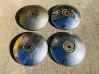 ROVER: A set of four hubcaps from a circa 1950s Rover, in used condition [Location: Sydney]