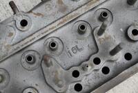AUSTIN-HEALEY: A 12-port cylinder head to suit 3000 models, has been crack tested but a small area of corrosion evident in one valve seat, repairable [Location: Sydney] - 3