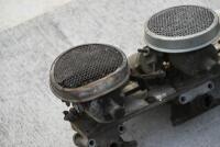 AUSTIN-HEALEY: A triple carburettor set-up to suit 3000 BN7 or BT7 models, including a crack-tested 12-port cylinder head that has never been machined, inlet valves, inlet and exhaust manifolds, triple carburettors, air cleaners and rocker cover. [Locatio - 12