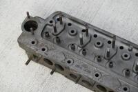 AUSTIN-HEALEY: A triple carburettor set-up to suit 3000 BN7 or BT7 models, including a crack-tested 12-port cylinder head that has never been machined, inlet valves, inlet and exhaust manifolds, triple carburettors, air cleaners and rocker cover. [Locatio - 19