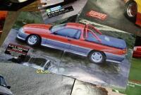 HOLDEN: A collection of unframed Commodore Crazy posters plus a 50th Anniversary poster depicting the model history of Holden-GM-H - 7
