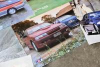 HOLDEN: A collection of unframed Commodore Crazy posters plus a 50th Anniversary poster depicting the model history of Holden-GM-H - 9