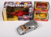 FERRARI LAMBORGHINI: A collection of 4 Ferrari and Lamborghini models, 1:43 scale ferrari Testarossa, 1:24 scale Ferari F1 race car, !:43 scale Lamborghini Countach, 1:24 scale Lamborghini
