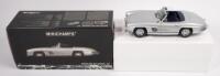 MERCEDES BENZ 300SL: A 1:18 scale 1957 Mercedes Benz 300 SL roadster, finished in silver&nbsp;paintwork