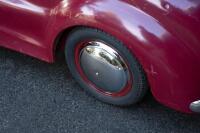 A nice 1950s&nbsp;Austin J40 (Junior) pedal car, maroon paintwork appears to be original with touch-ups with later electric headlamps fitted, 45cm high, approx 1.4m long [Location: Melbourne] - 3