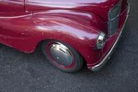 A nice 1950s&nbsp;Austin J40 (Junior) pedal car, maroon paintwork appears to be original with touch-ups with later electric headlamps fitted, 45cm high, approx 1.4m long [Location: Melbourne] - 8