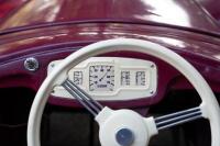 A nice 1950s&nbsp;Austin J40 (Junior) pedal car, maroon paintwork appears to be original with touch-ups with later electric headlamps fitted, 45cm high, approx 1.4m long [Location: Melbourne] - 10