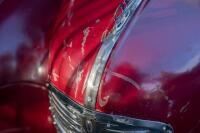 A nice 1950s&nbsp;Austin J40 (Junior) pedal car, maroon paintwork appears to be original with touch-ups with later electric headlamps fitted, 45cm high, approx 1.4m long [Location: Melbourne] - 13