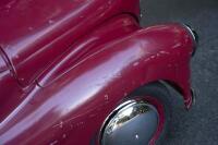 A nice 1950s&nbsp;Austin J40 (Junior) pedal car, maroon paintwork appears to be original with touch-ups with later electric headlamps fitted, 45cm high, approx 1.4m long [Location: Melbourne] - 15