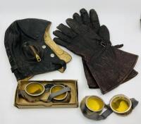 HELMET, GLOVES & GOGGLES: A leather ensemble consisting of a Lasicas 1942 helmet (size 7 1/4), pair of gloves and two sets of goggles (one boxed) from the Eric Bourn collection [Location: Sydney]