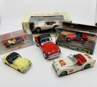 TRIUMPH: Six die cast Triumph TR2 & TR3 models of various scales and makers, three in original boxes and three unboxed [Location: Sydney]