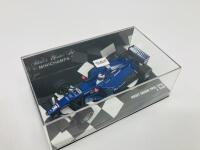 PROST & LIGIER: Three Minichamps 1:43 scale models of J Trulli&rsquo;s Post-Peugeot AP01 & 1999 GP plus O Panis&rsquo; Ligier-Honda JS41, boxed [Location: Sydney] - 3