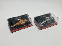 MCLAREN-MERCEDES: Two Minichamps 1:43 scale models of the McLaren Mercedes MP4-12 of David Coulthard and MP4-13 of David Coulthard, boxed [Location: Sydney]