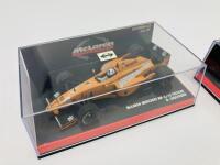MCLAREN-MERCEDES: Two Minichamps 1:43 scale models of the McLaren Mercedes MP4-12 of David Coulthard and MP4-13 of David Coulthard, boxed [Location: Sydney] - 2
