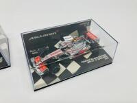 MCLAREN-MERCEDES: Two Minichamps 1:43 scale models of the Vodafone McLaren Mercedes MP4-22 of Lewis Hamilton (2007) and MP4-23 Kovalainen (2008) boxed [Location: Sydney] - 3