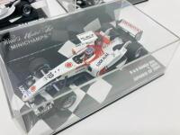 BAR-HONDA: Three Minichamps 1:43 scale models 2004 Takuma Sato Japanese GP, 007 Takuma Sato, 007 Jenson Button, boxed [Location: Sydney] - 4