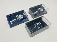 WILLIAMS: Three Minichamps 1:43 scale models of the Williams FW21 Launch Car, FW24 Juan Pablo Montoya and FW28 of Nico Rosberg, boxed [Location: Sydney]