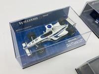 WILLIAMS: Three Minichamps 1:43 scale models of the Williams FW21 Launch Car, FW24 Juan Pablo Montoya and FW28 of Nico Rosberg, boxed [Location: Sydney] - 2