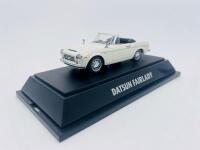 DATSUN: A 1:43 scale model by Ebbro of the Datsun&nbsp;Fairlady 2000&nbsp;in white, complete with original packaging [Location: Sydney] - 2