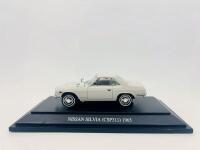 NISSAN: A 1:43 scale model by Ebbro of the Nissan Silvia CSP311 in white, complete with original packaging [Location: Sydney]