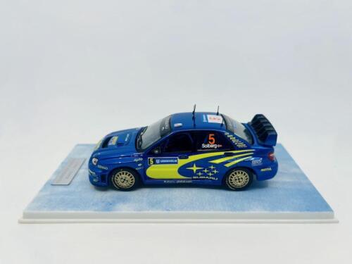 SUBARU: A 1:43 scale model of the Subaru Imprezza WRC driven by Peter Solberg in the 2005 Sweden rally, finished in works livery, complete with original packaging. Limited Edition #1396/3000. [Location: Sydney]