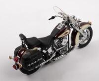 HARLEY DAVIDSON: A 1:10 scale Harley Davidson Heritage Softail motorcycle model by Franklin Mint&nbsp; [Location: Melbourne] - 2