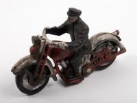 CAST TOY: A modern cast motorcycle patrol bike with mounted figure, 16cm long, 10cm high v