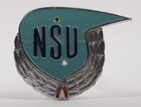 NSU: An NSU Motorcycles badge belt buckle, 8cm high, 10cm long [Location: Melbourne]