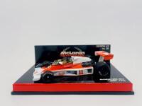 MCLAREN: A 1:43 scale model by Minichamps of the McLaren&nbsp;Ford&nbsp;M23, driven by James Hunt, edition 43, no. 38. Complete with original display case [Location: Sydney]