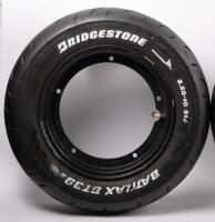 VESPA: Three black Vespa rims fitted with Bridgestone 3.50-10 51J tyres. - 2