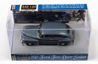 FORD DELUXE SEDAN:&nbsp;A 1:43 scale 1941 Ford two door sedan,&nbsp;finished in capri blue metallic&nbsp;paintwork