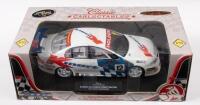 HOLDEN VT COMMODORE:&nbsp;A 1:18&nbsp;scale Holden VT commodore, this is a year 2000 super car model, the number #12 race car as raced by Greg Murphy, in full K-mart racing livery