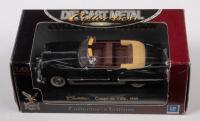 CADIILAC:&nbsp;A 1:43 scale 1949 Cadillac coupe de ville,&nbsp;finished in black&nbsp;paintwork