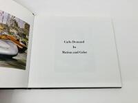 CARLO DEMAND IN MOTION AND COLOR: AUTOMOBILE RACING 1895-1956 hardcover book by Gary D. Doyle, published by Racemaker Press in 2007 [Location: Sydney] - 2
