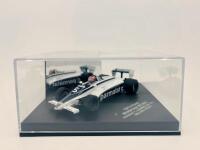 BRABHAM: A 1:43 scale model by Quartzo of the Brabham BT49C, winner of the 1981 San Marino Grand Prix, driven by Nelson Piquet, complete with plinth and display case [Location: Sydney] - 5