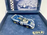 LOLA: A 1:43 scale model by Fly Car Model&nbsp;of the Lola T70 Spyder, winner of the 1966 Bridgehampton Grand Prix,&nbsp;driven by Dan Gurney. Limited edition, No.1429,&nbsp;complete with original packaging [Location: Sydney] - 2