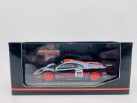 MCLAREN: A 1:43 scale model by Minichamps of the GTC Racing/Gulf&nbsp;McLaren F1 GTR&nbsp;Long Tail, driven by Ray Bellm, Andrew Gilbert-Scott and Masanori Sekiya in the 1997&nbsp;24 Hours of Le Mans, complete with original packaging [Location: Sydney] - 8